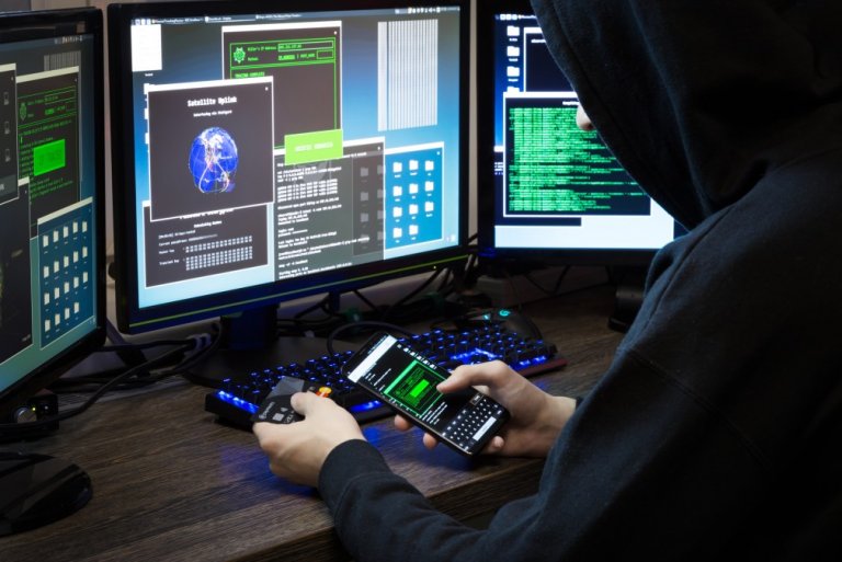 cyber-security-hack-business-financial-man-person-unrecognizable-criminal-thief-pc-electronics-screen_t20_pxQ8Gd.jpg