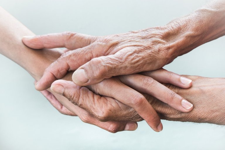 hands-of-young-adults-and-older-women-on-a-light-background-adult-age-aged-aging-background-care_t20_N00aVE.jpg